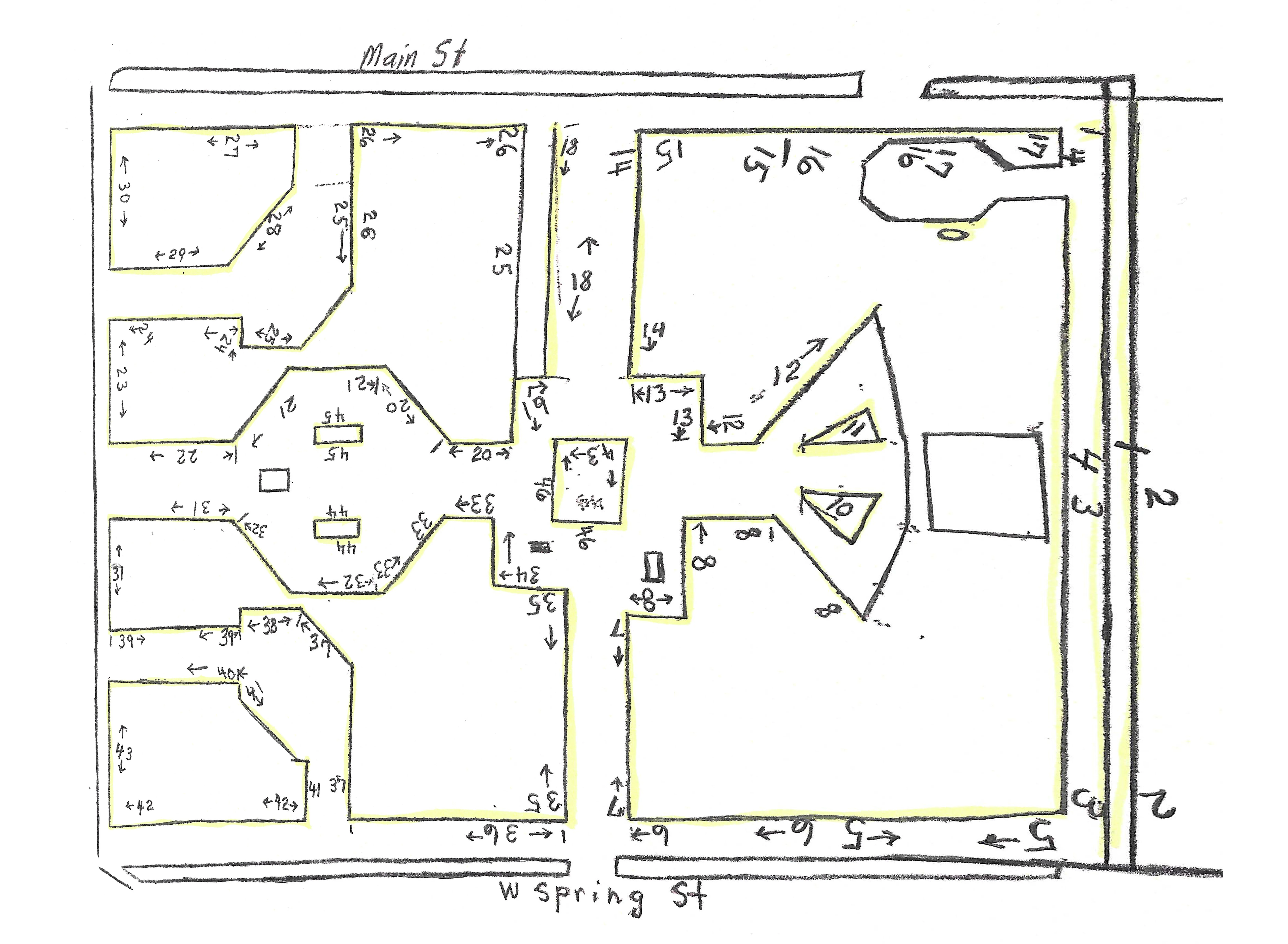 Hand-drawn map of Veterans Memorial Park showing numbered memorial sections, with Main Street at the top and West Spring Street at the bottom